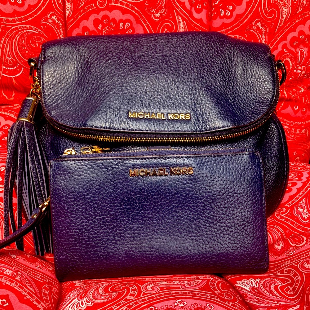 Michael Kors purse with matching wallet.